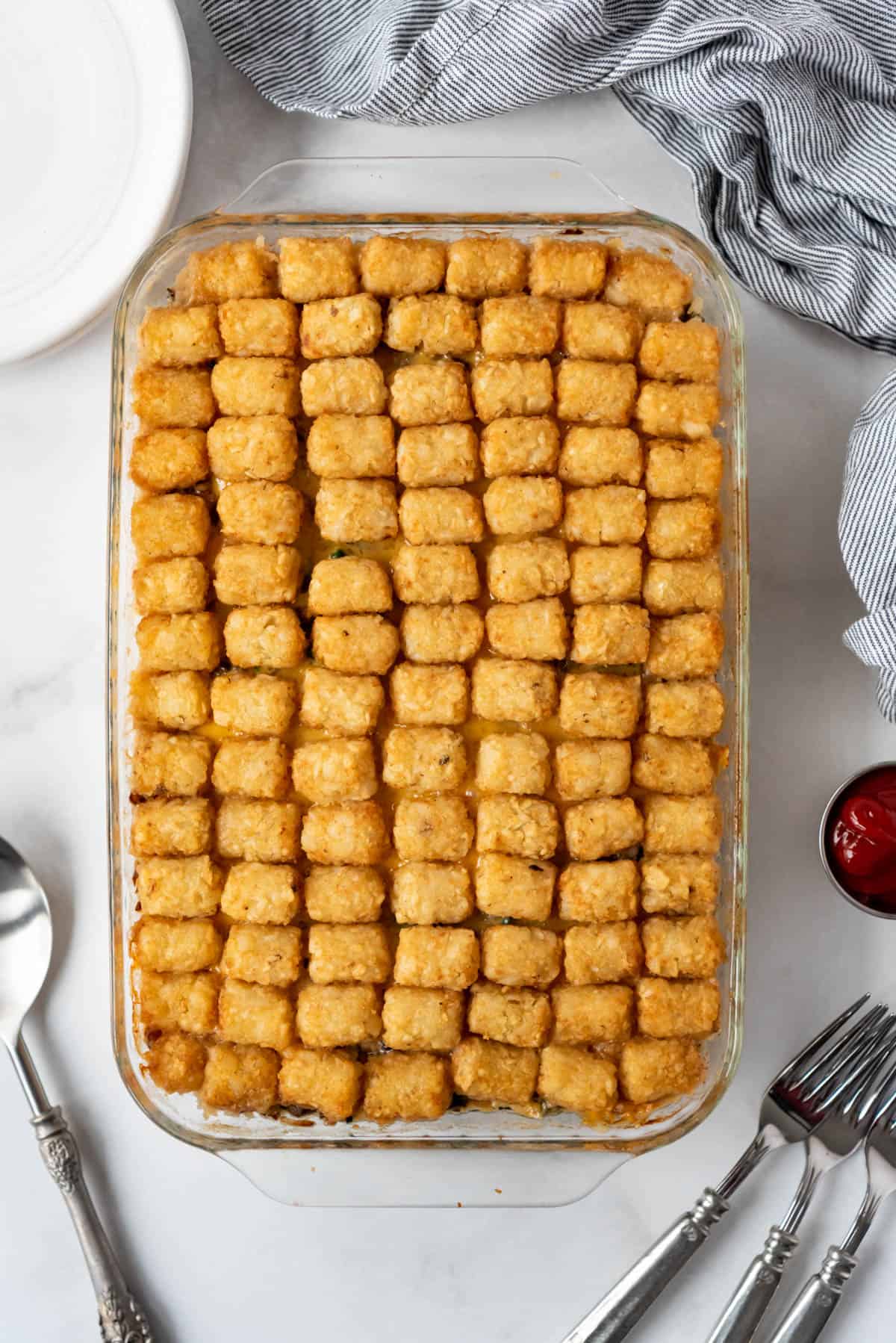 An overhead image of a finished tater tot casserole.