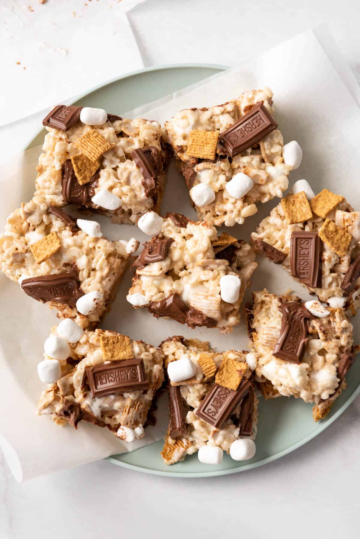 S'mores rice krispies treats squares on a plate.