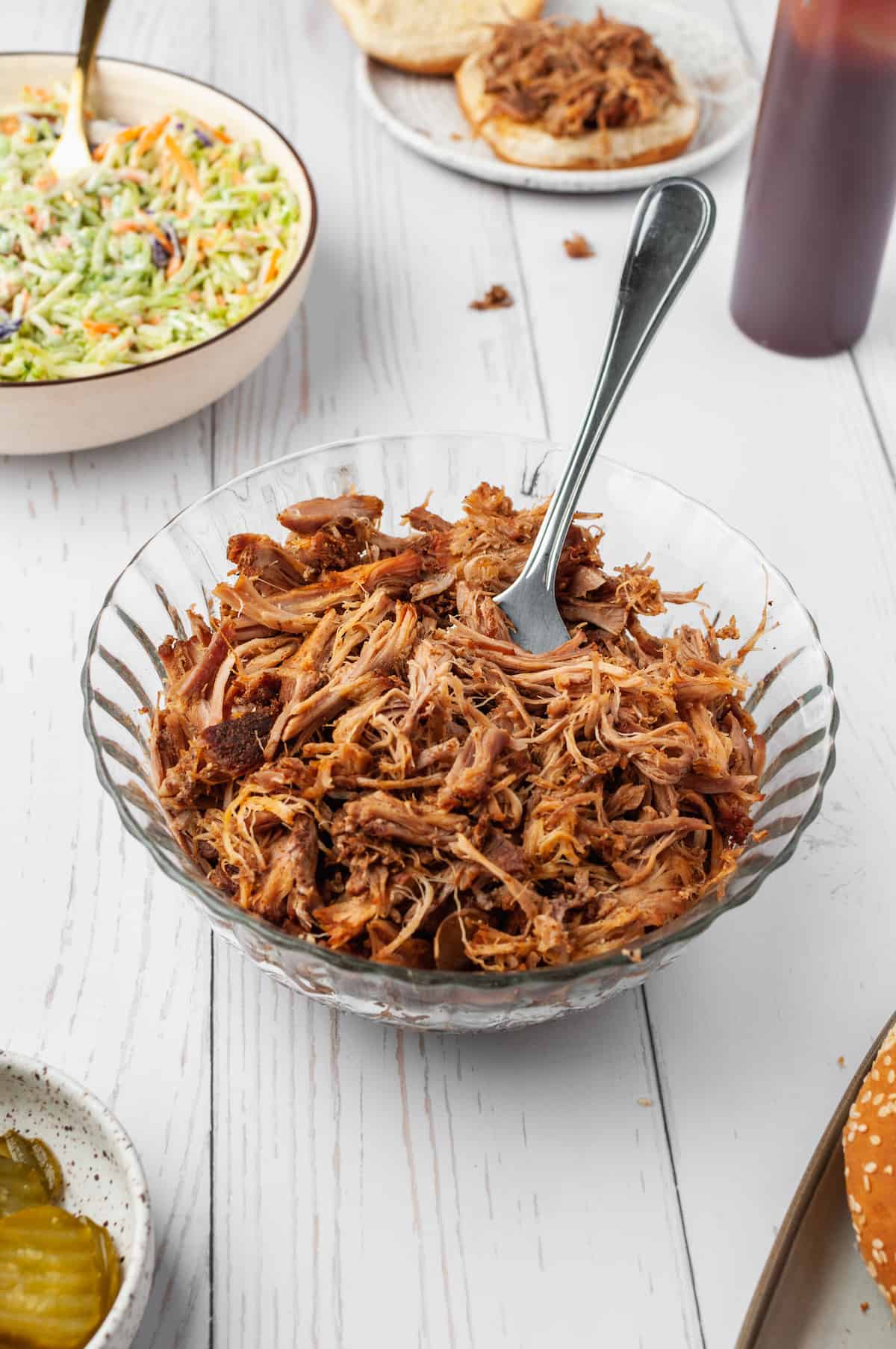 Slow cooker pulled pork in glass bowl