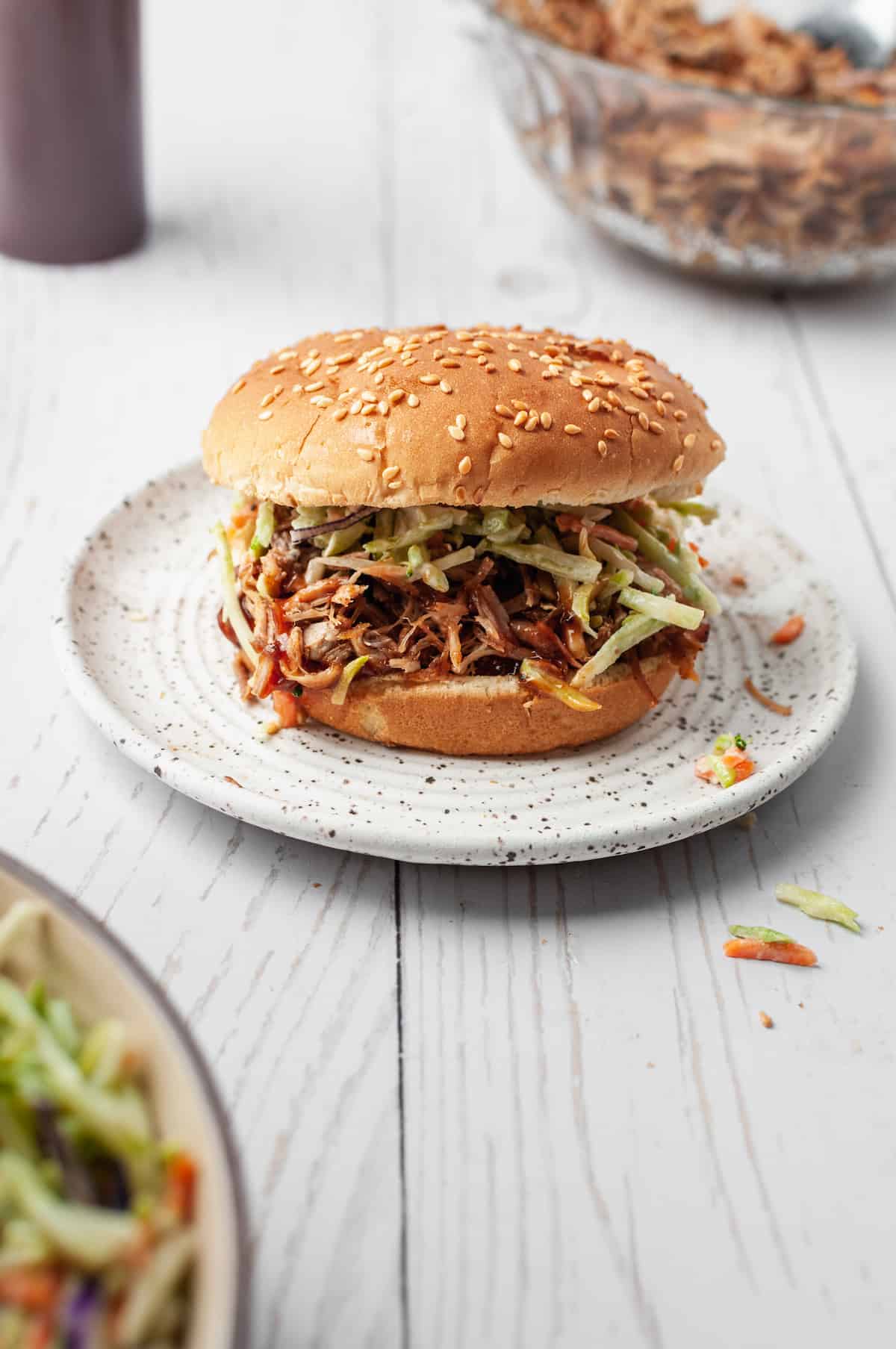 Pulled pork sandwich on plate with coleslaw