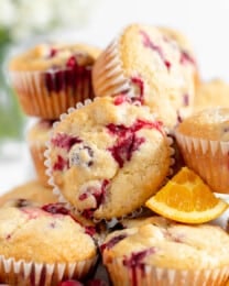 A pile of cranberry orange muffins.