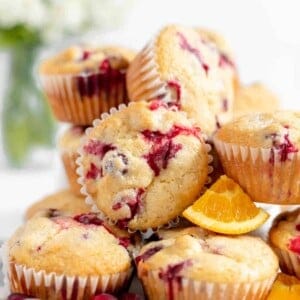 A pile of cranberry orange muffins.