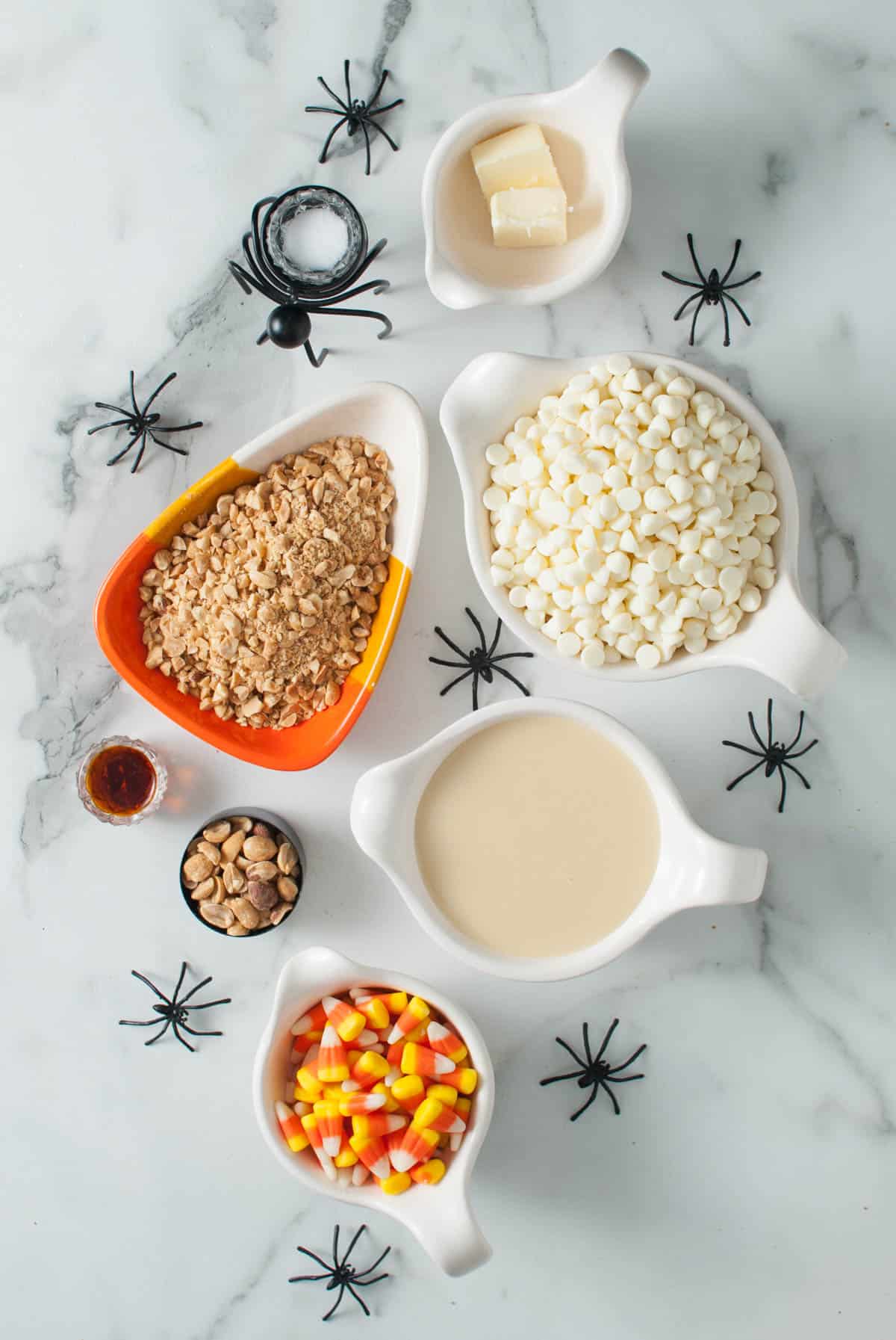 Ingredients for Halloween candy corn fudge in individual bowls.