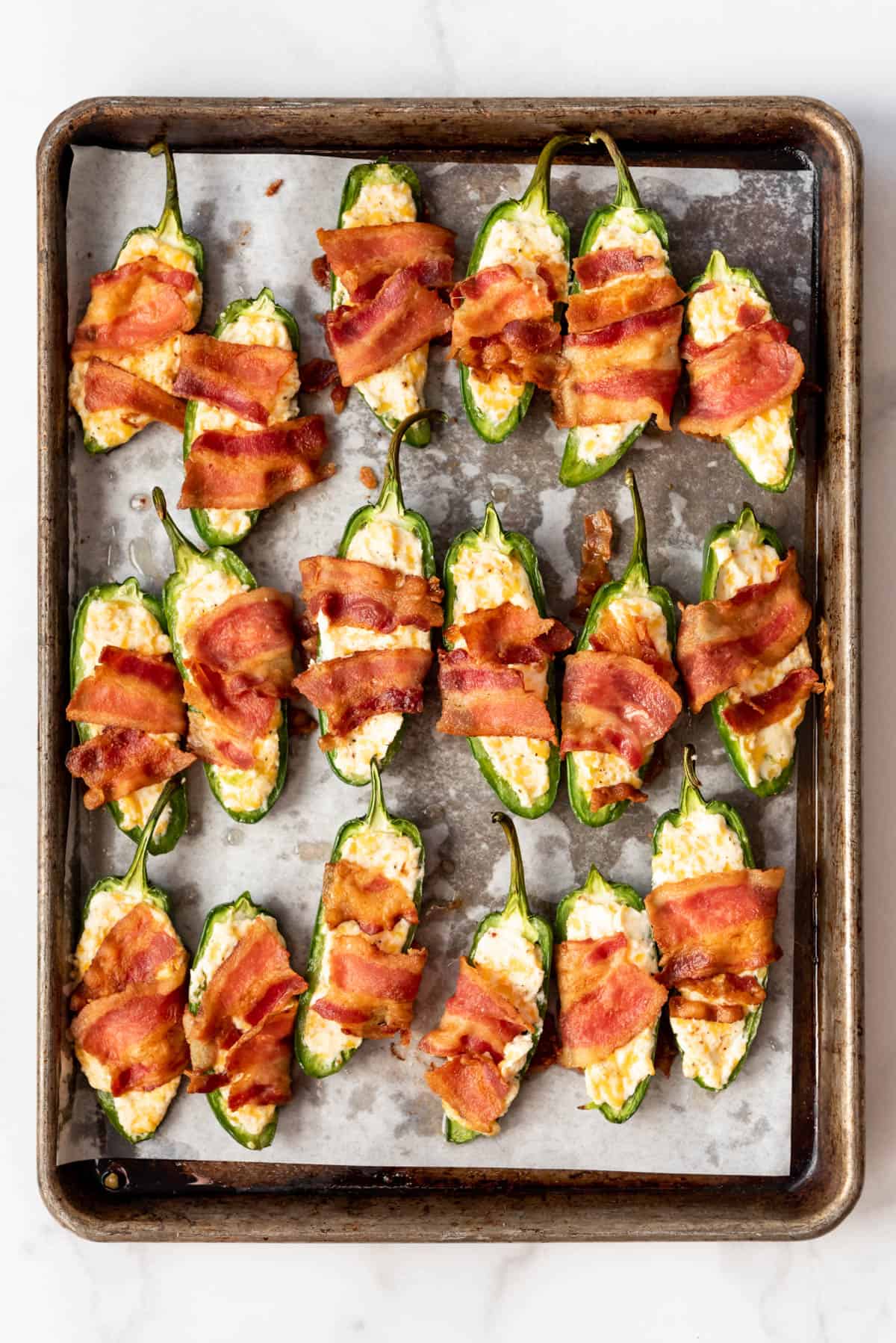Cream Cheese filled jalapenos with bacon.