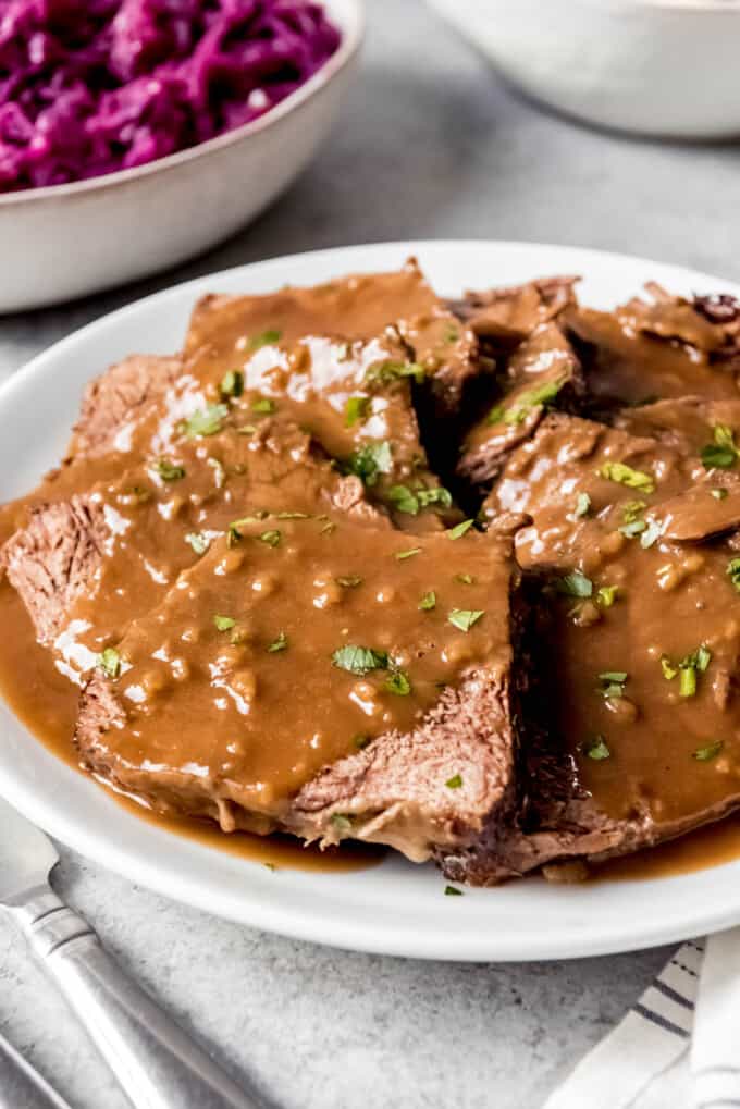 Close up of sauerbraten on a plate.