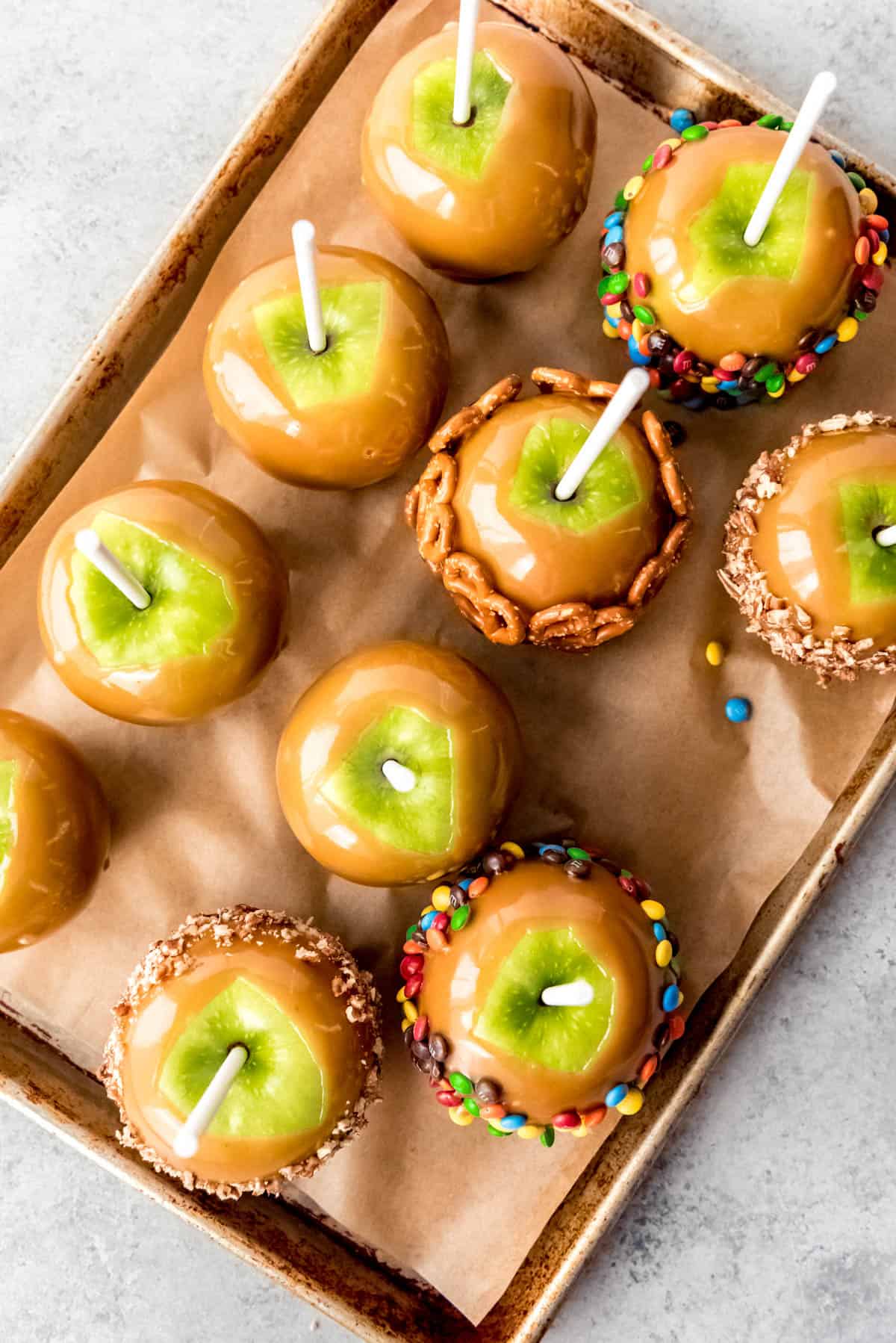 An image of granny smith apples covered in homemade caramel.