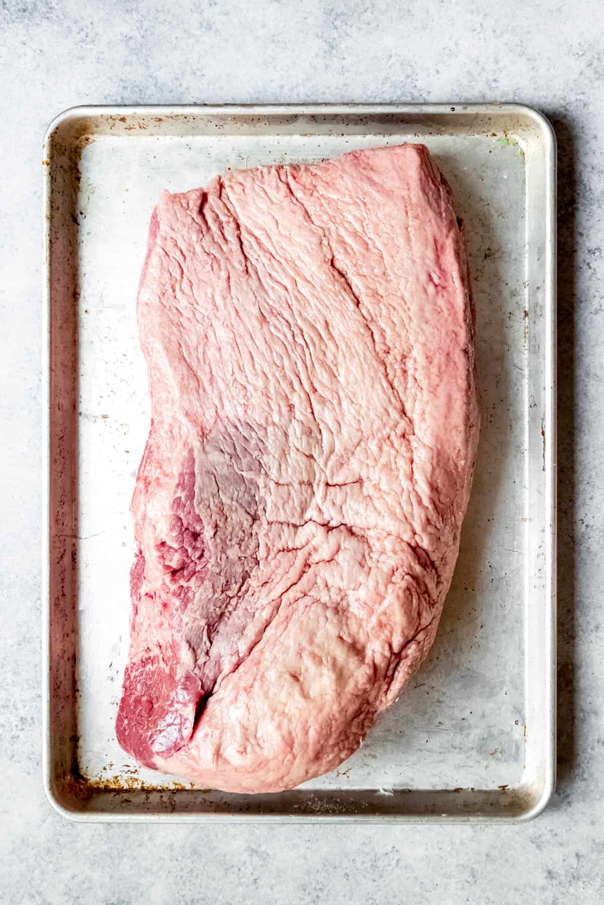 An image of the fat cap side of a packer brisket.
