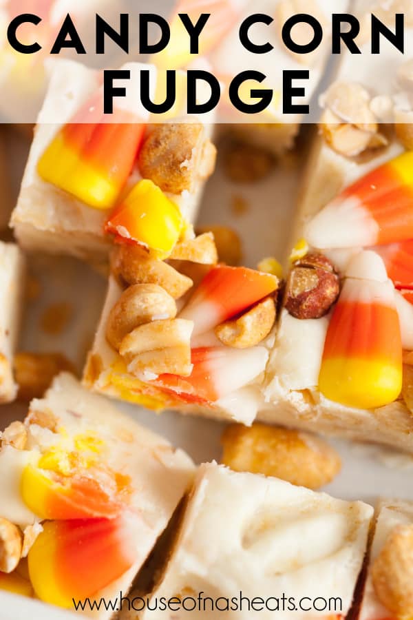 A piece of white chocolate fudge with candy corn and peanuts with text overlay.