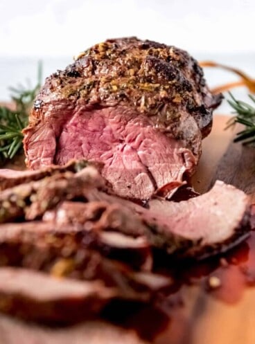 An image of the rosy pink center of a medium cooked beef tenderloin roast.