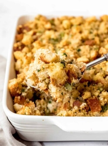 An image of a big scoop of homemade cornbread dressing.