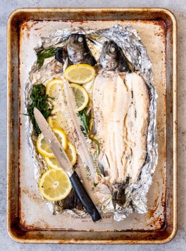 An image of baked rainbow trout with the bones removed.