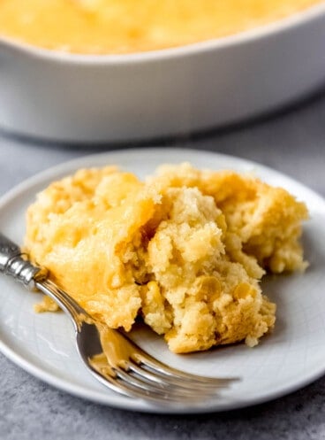 An image of a large scoop of corn casserole on a plate.