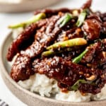 Mongolian Beef in a bowl over rice.