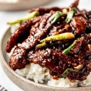 Mongolian Beef in a bowl over rice.