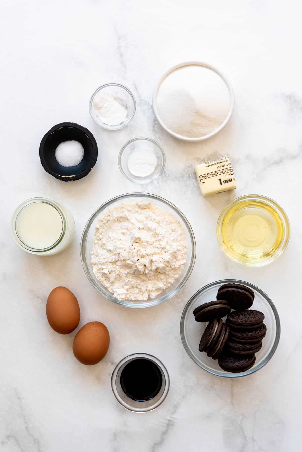 Top view of ingredients needed to make Oreo Cupcakes with Cookies & Cream Frosting. 
