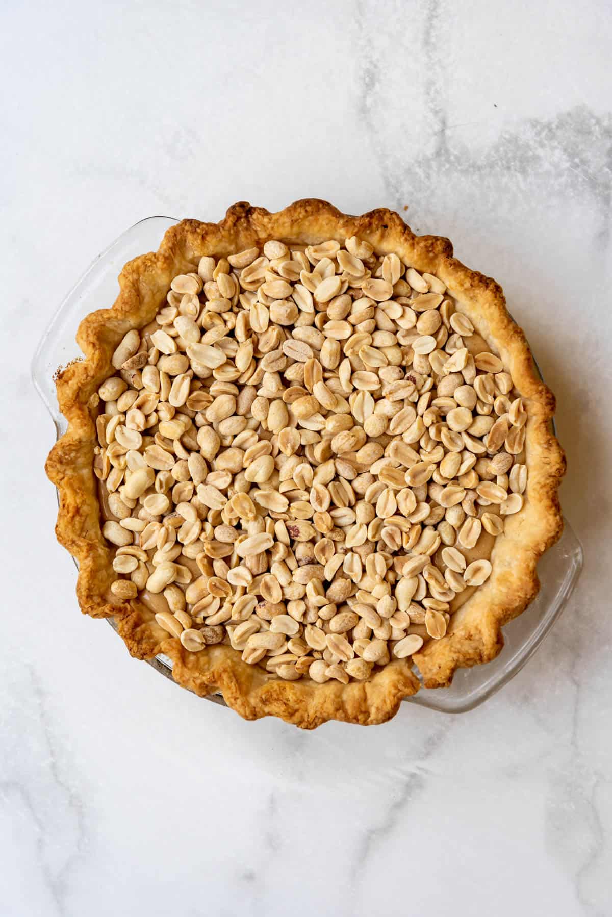 Roasted peanuts in a pie crust with nougat filling.