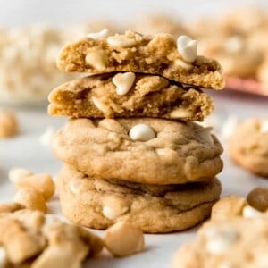 Close up of a stack of White Chocolate and Macadamia Nut cookies.