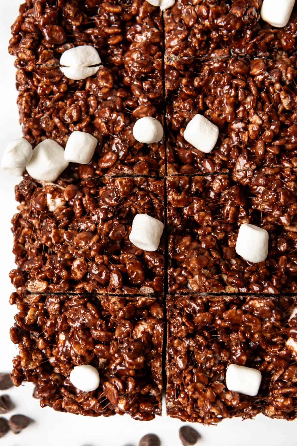 Gooey chocolate rice krispies treats cut into squares.