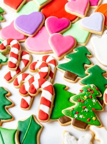 Christmas, Halloween, and Valentine's Day sugar cookies decorated with royal icing.