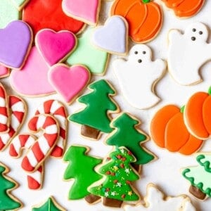 Christmas, Halloween, and Valentine's Day sugar cookies decorated with an easy royal icing recipe.