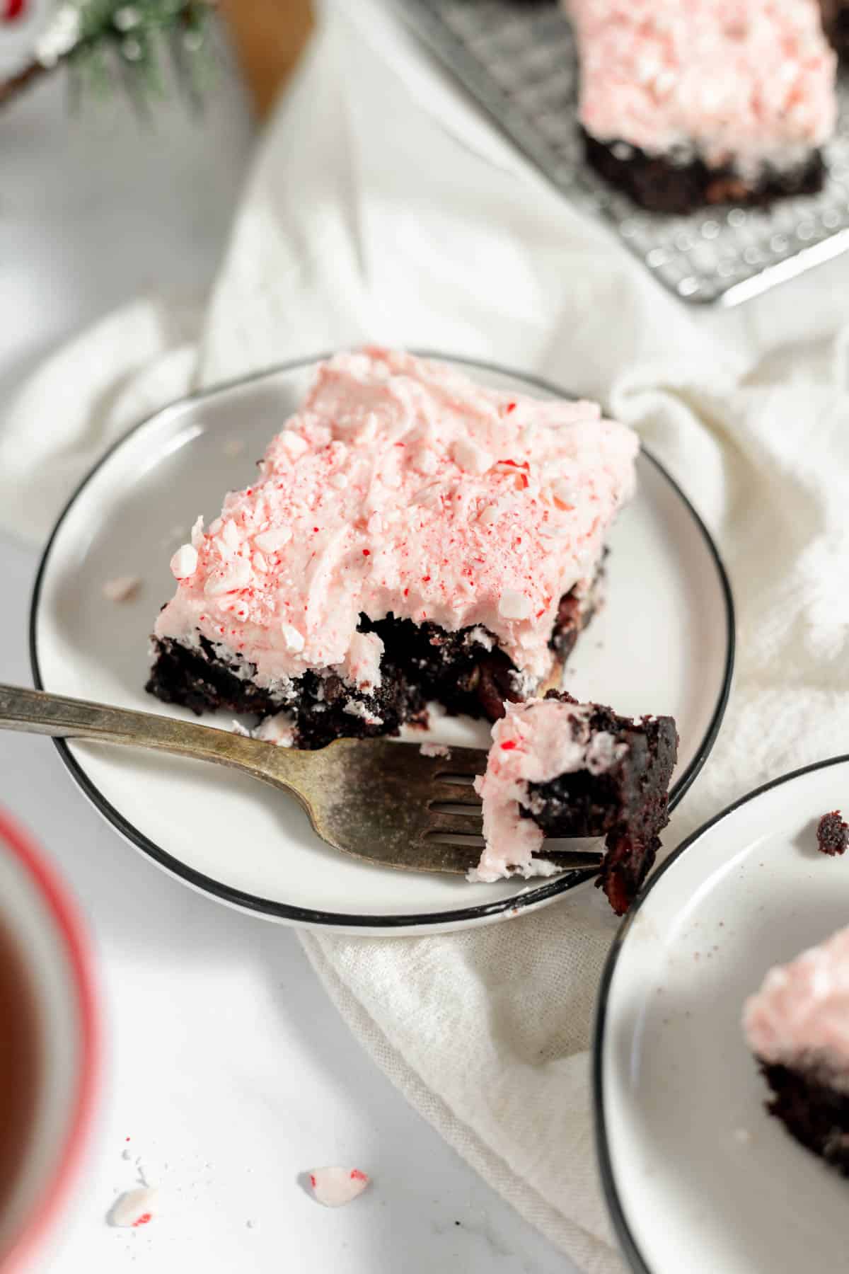 A candy cane brownie with a bite taken out of it.