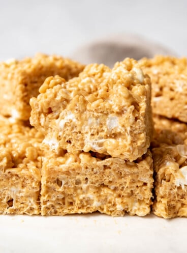 Close up of a peanut butter krispie treat bars stacked one on the other.