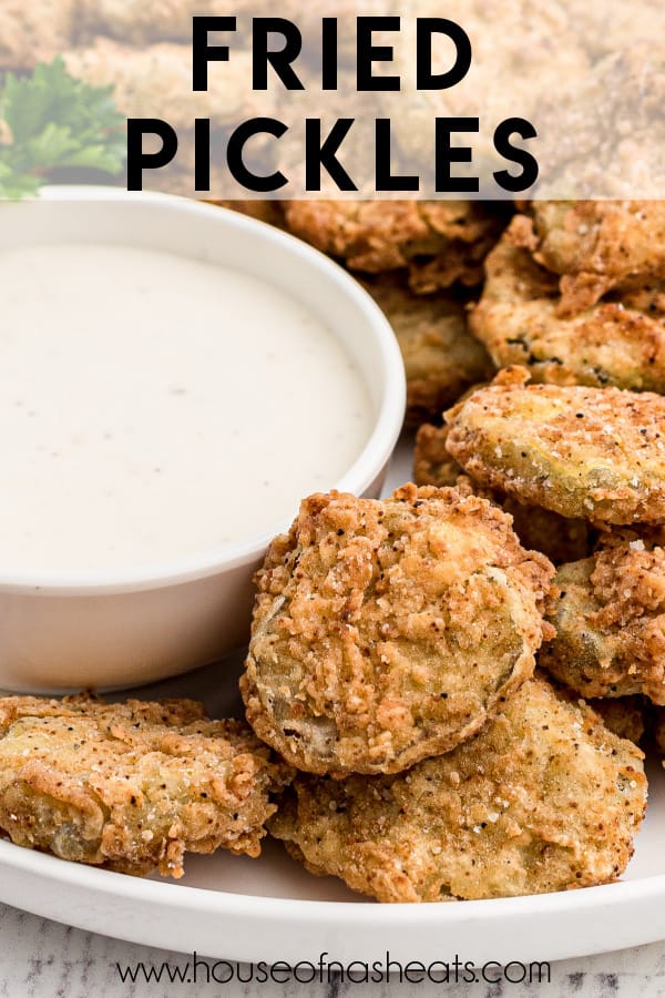 A close-up image of fried pickles next to a bowl of ranch dressing with text overlay.