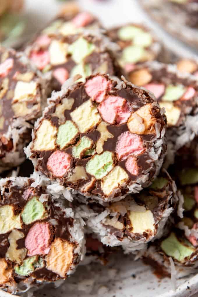 A close image of church window cookies made with multi-colored marshmallows, walnuts, chocolate, and coconut.