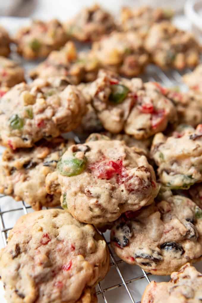 A close image of fruitcake cookies made with candied fruit and nuts.