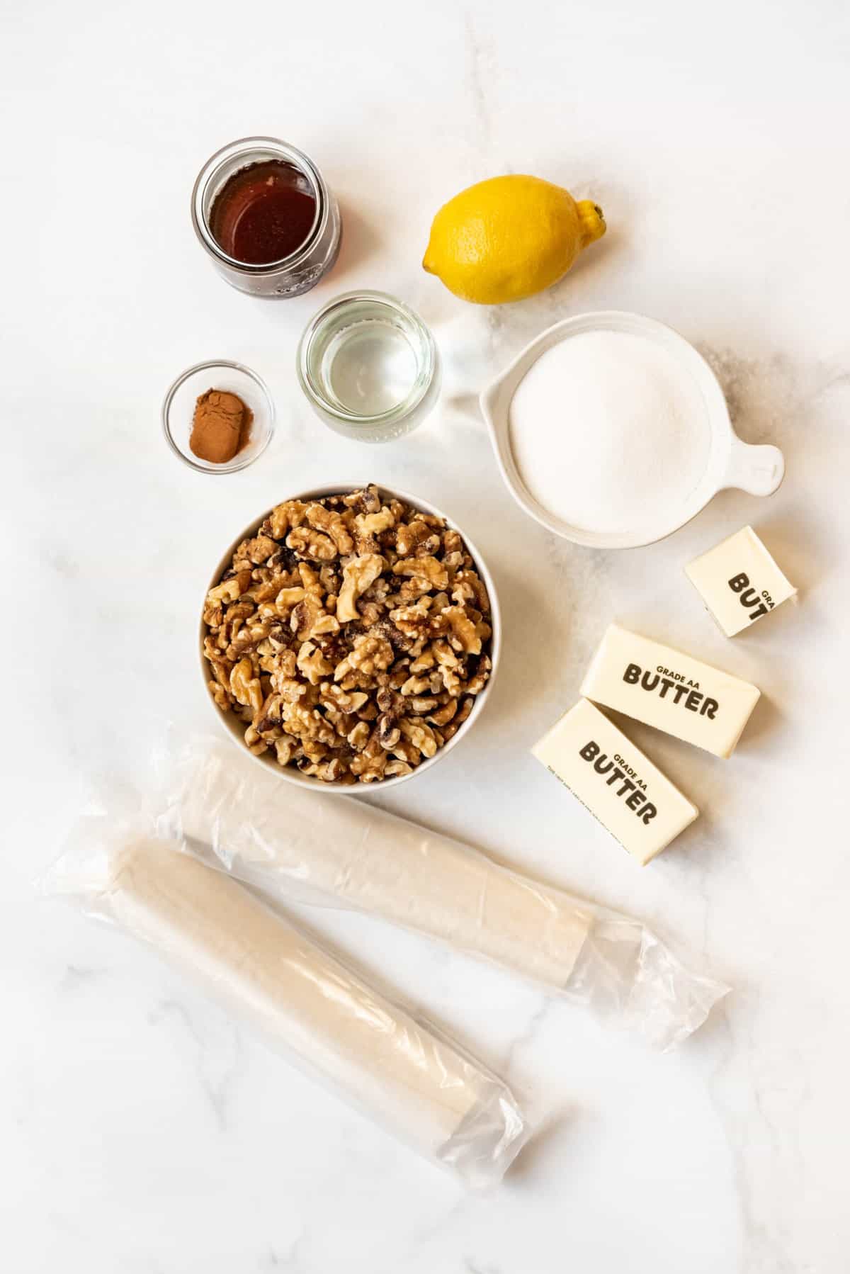 Top view of Ingredients for making Greek baklava laid out on a worktop. 