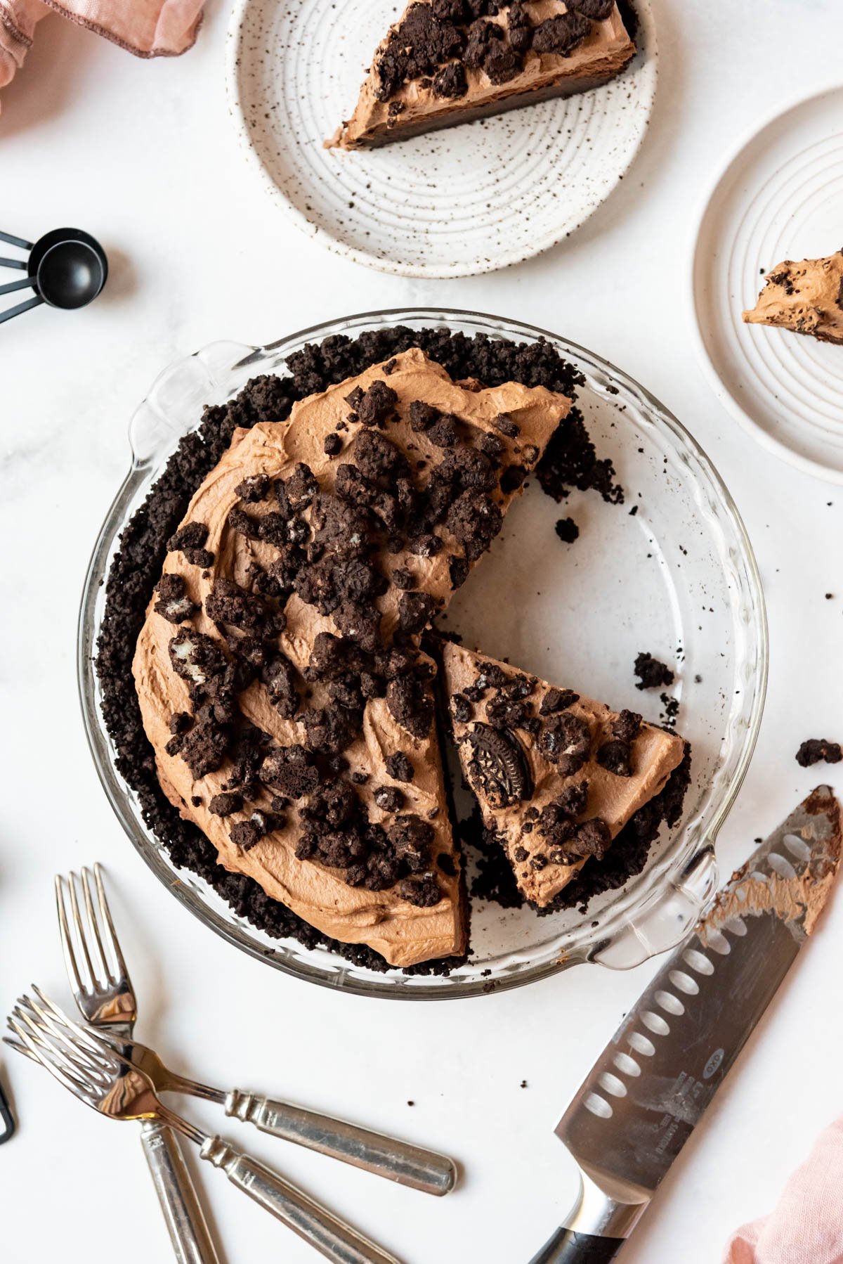 An overhead image of Mississippi mud pie with some slices removed from it.