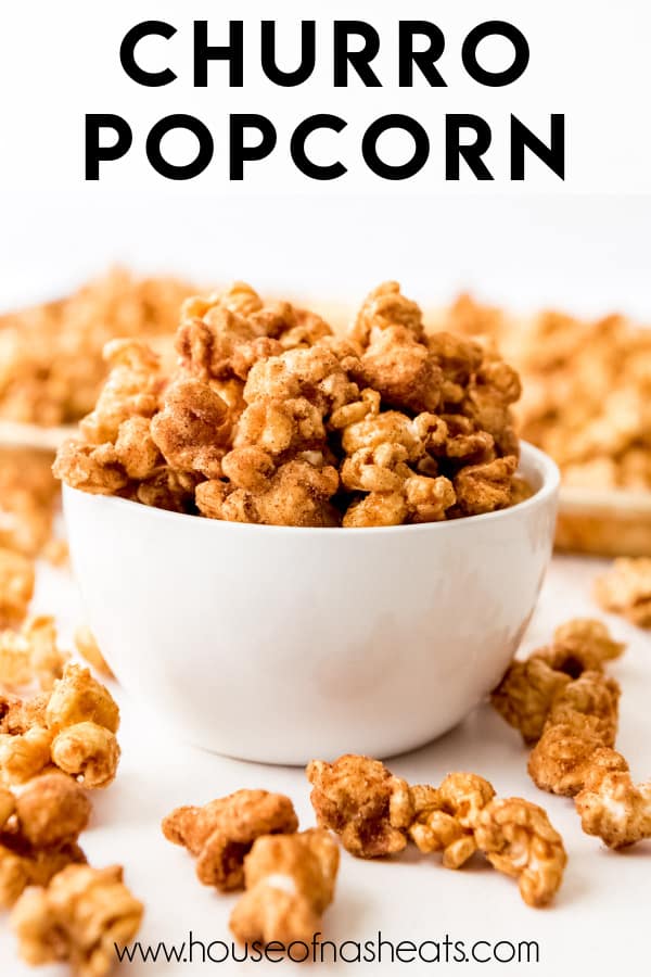 A white bowl of churro popcorn with text overlay.