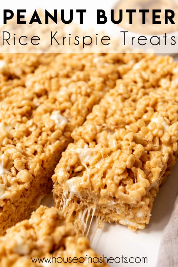 Peanut butter rice krispies treats cut into squares with one being pulled away from the others with text overlay.
