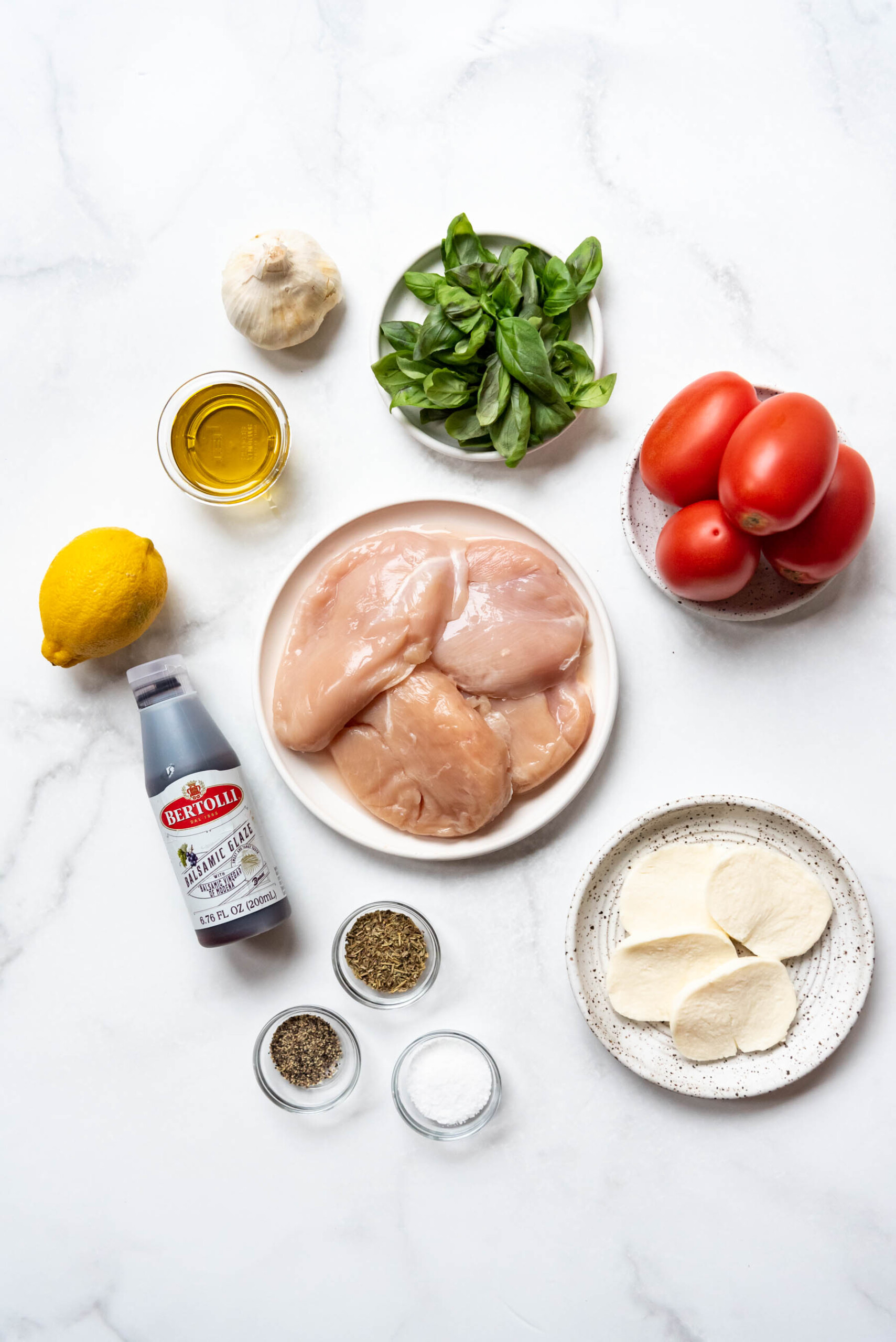 Ingredients for making bruschetta chicken.