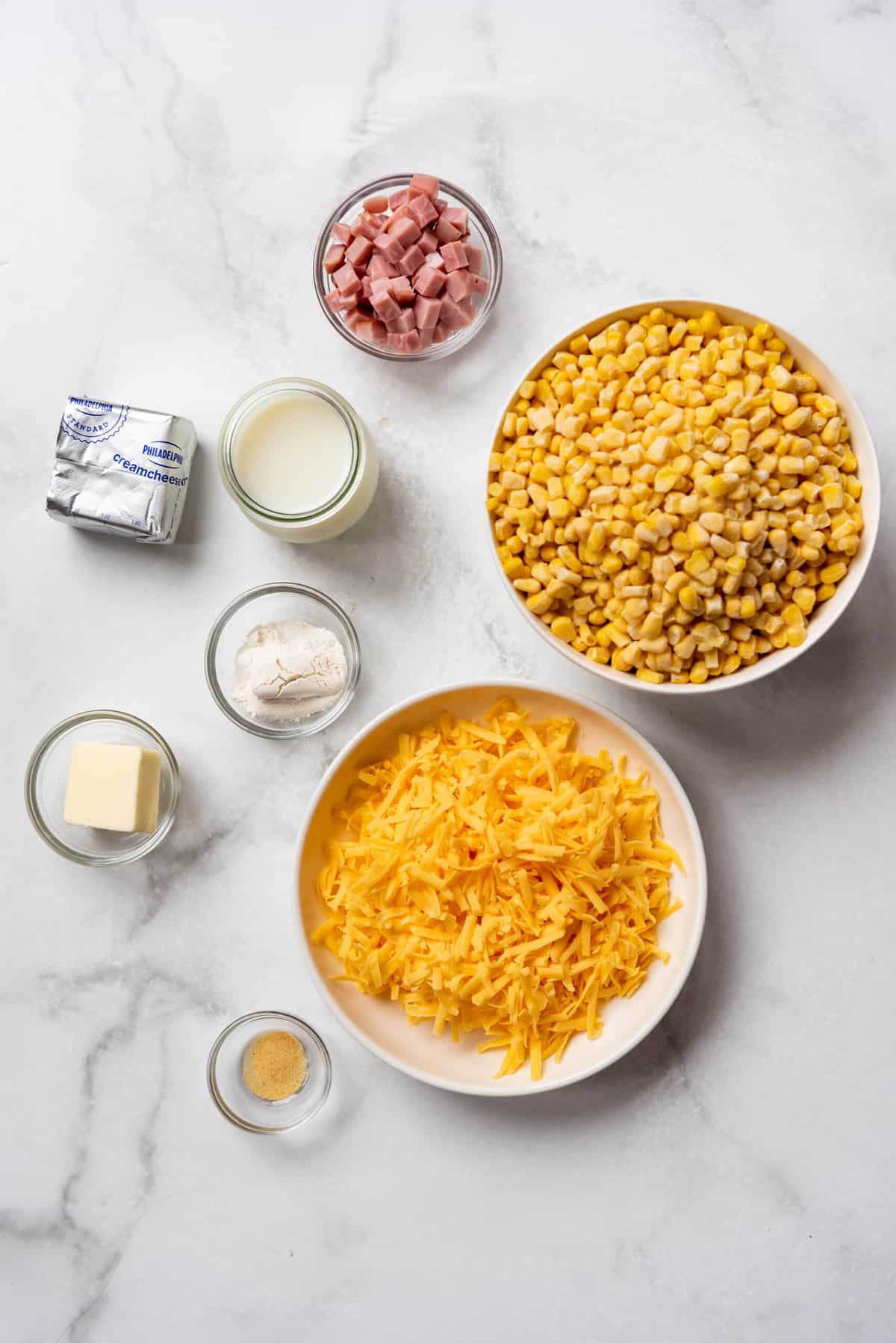 Ingredients for cheesy corn with ham.