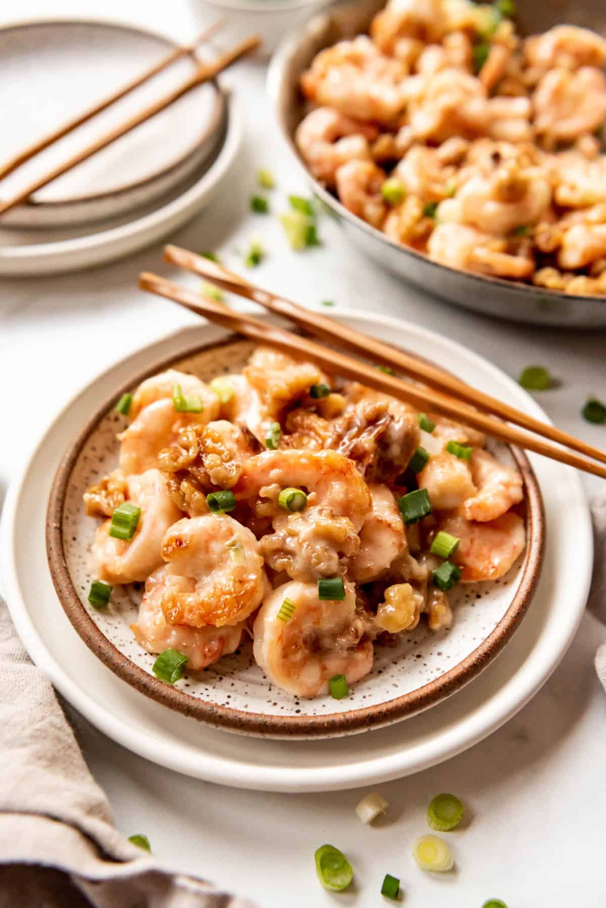 A plate of copycat takeout honey walnut shrimp.