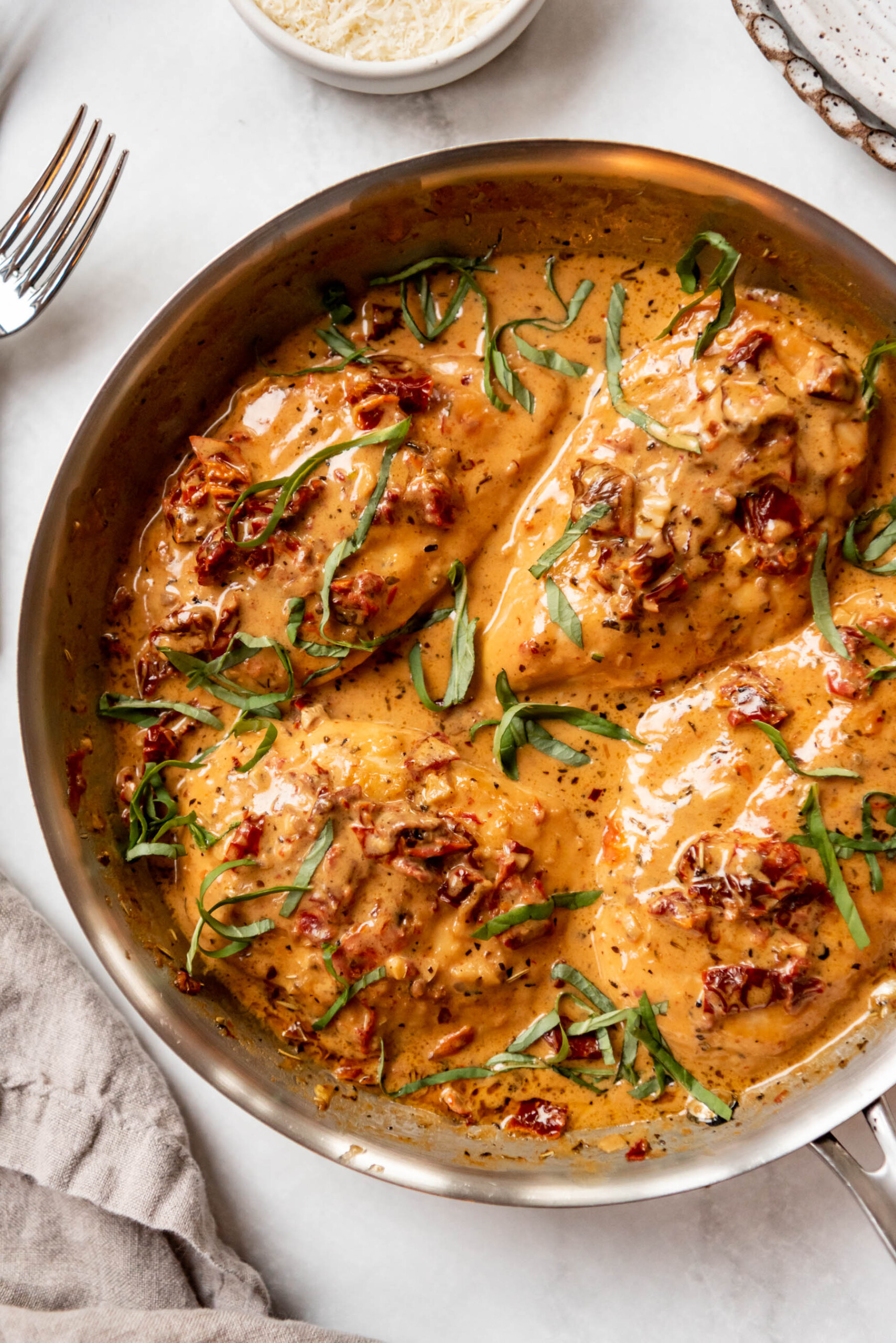 Seared chicken breasts in a creamy tuscan sauce made with sundried tomatoes and basil.