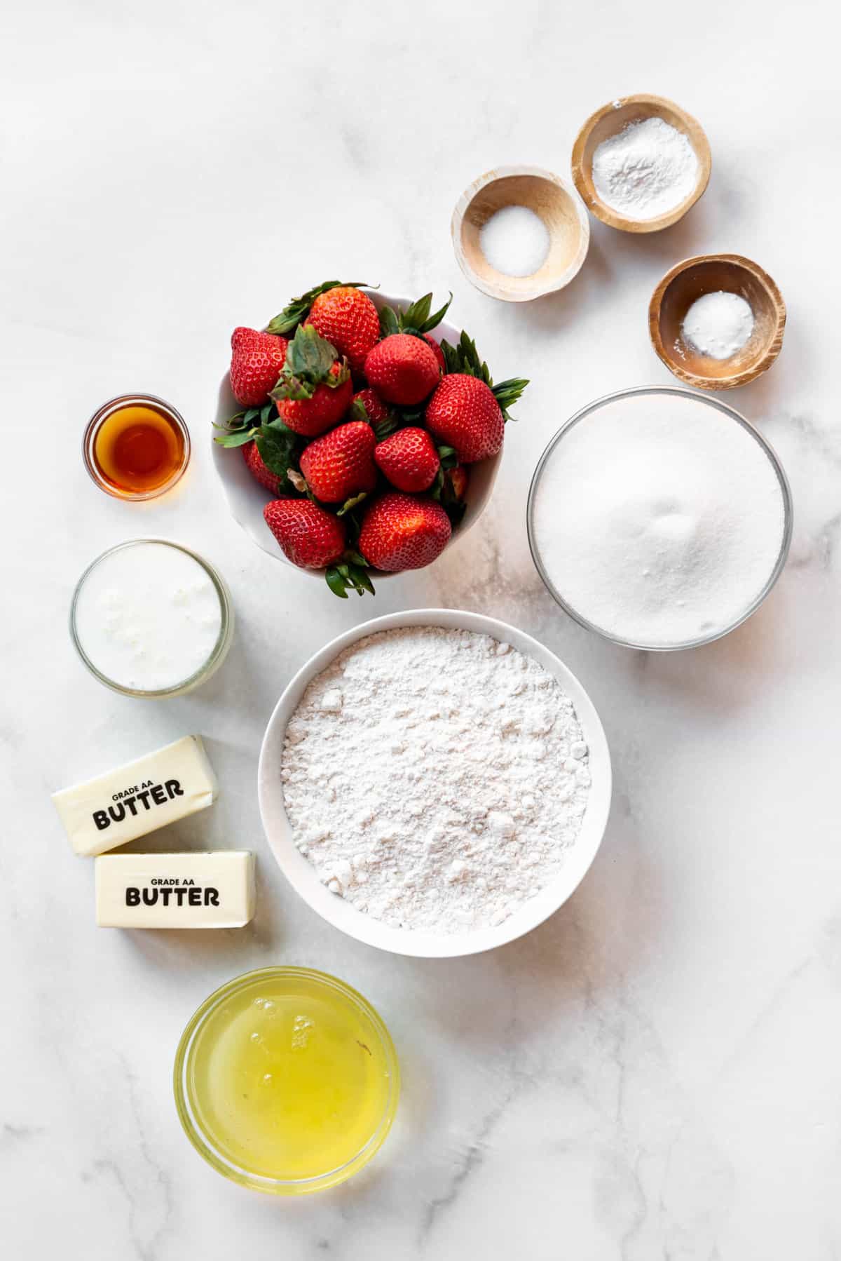 Top view of ingredients to make fresh strawberry cake. 