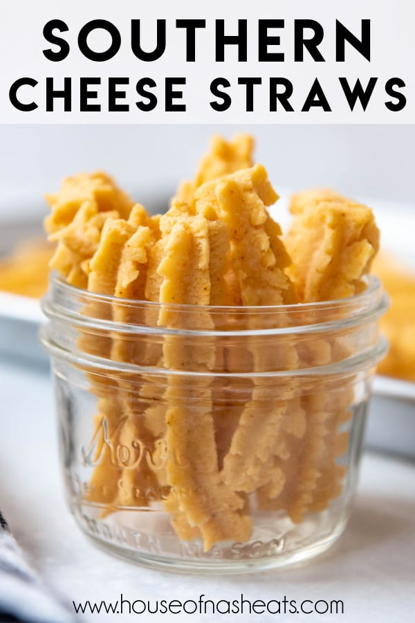 Cheese straws in a small glass jar with text overlay.