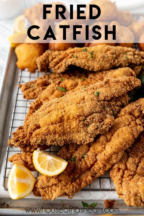 Fried catfish fillets on a wire rack with text overlay.