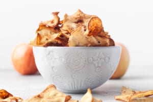 A bowl of homemade apple chips.