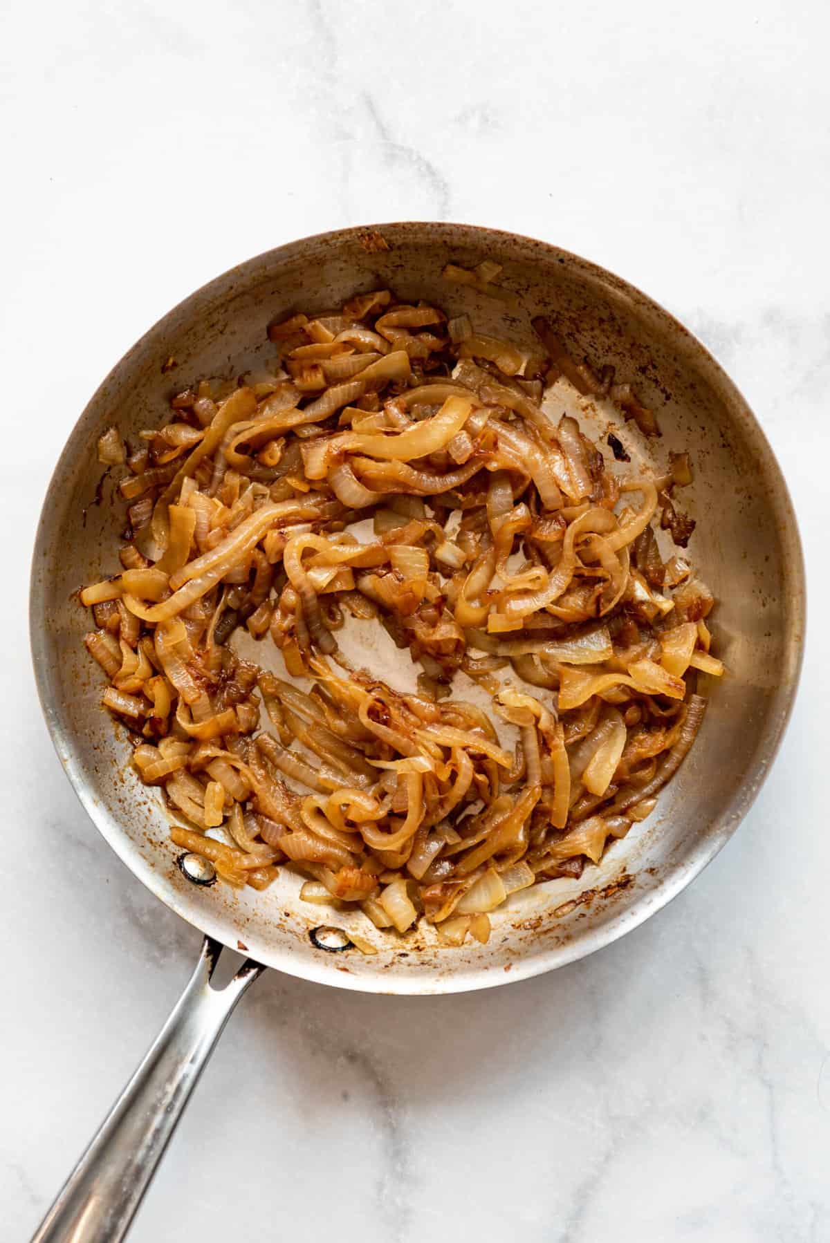 Caramelized onions in a large skillet.