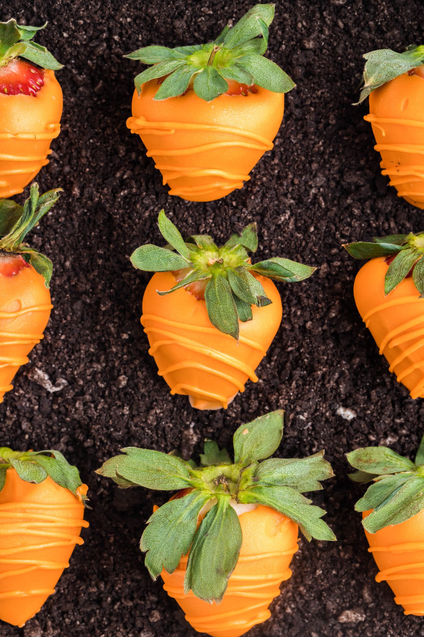 Easter chocolate covered strawberries arranged in rows.