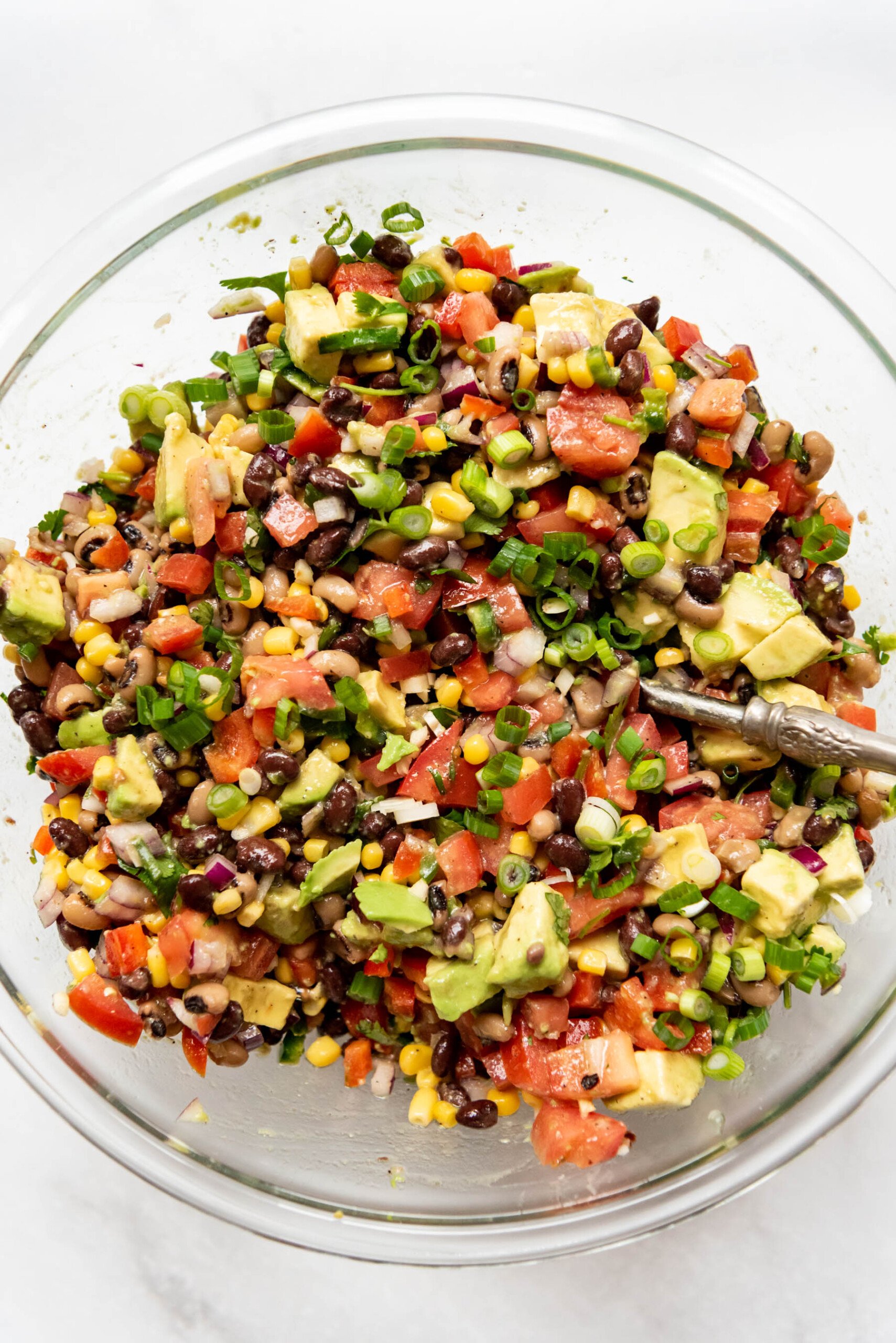 Cowboy caviar in a bowl after everything has been tossed together.