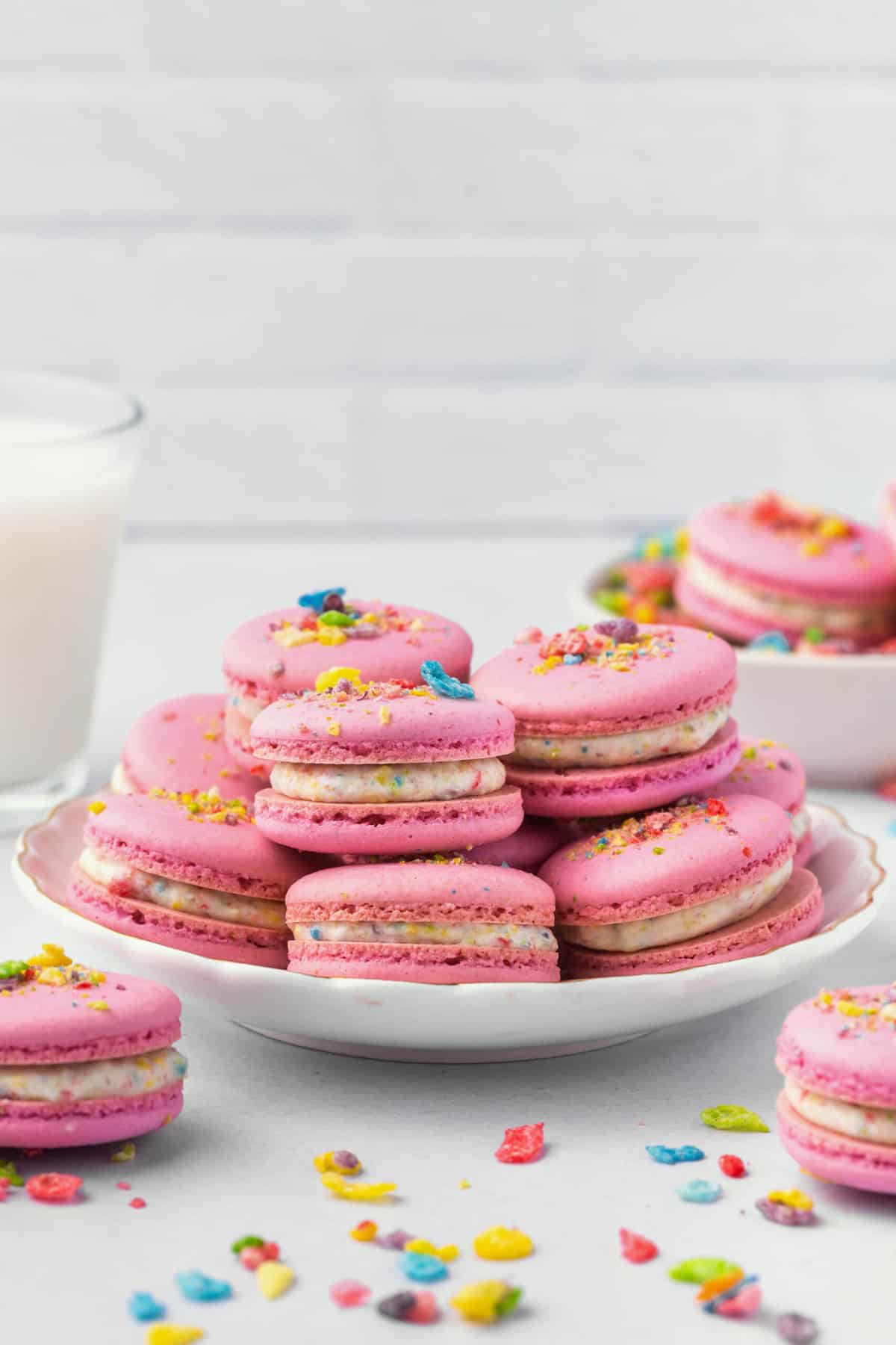 A plate of stacked Fruity Pebbles macarons.