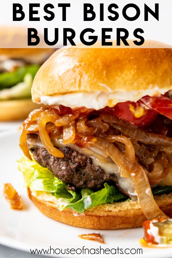 A close image of a juicy bison burger with caramelized onions with text overlay.
