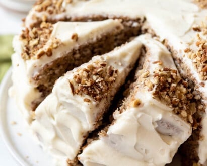 Slices of hummingbird cake leaning against each other.