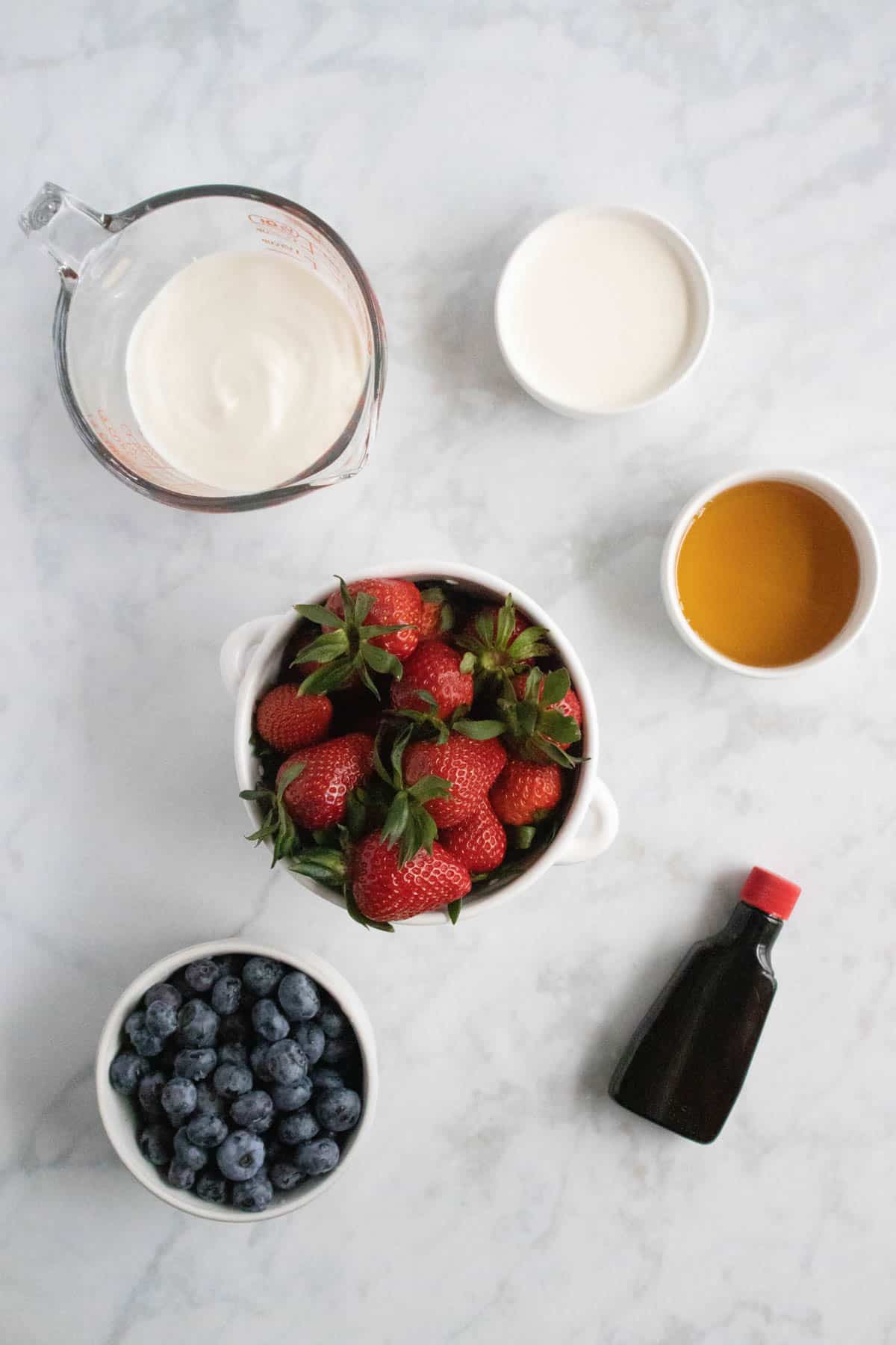 Ingredients for strawberry and blueberry patriotic popsicles.