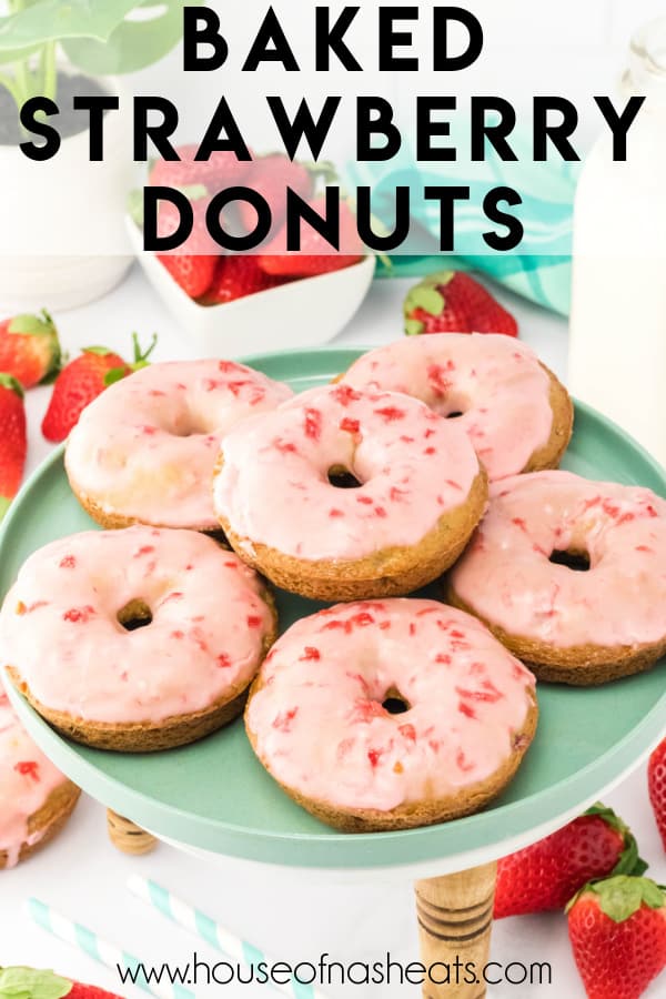 Baked strawberry donuts on a green plate with text overlay.