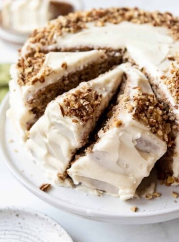 Slices of hummingbird cake leaning against each other.